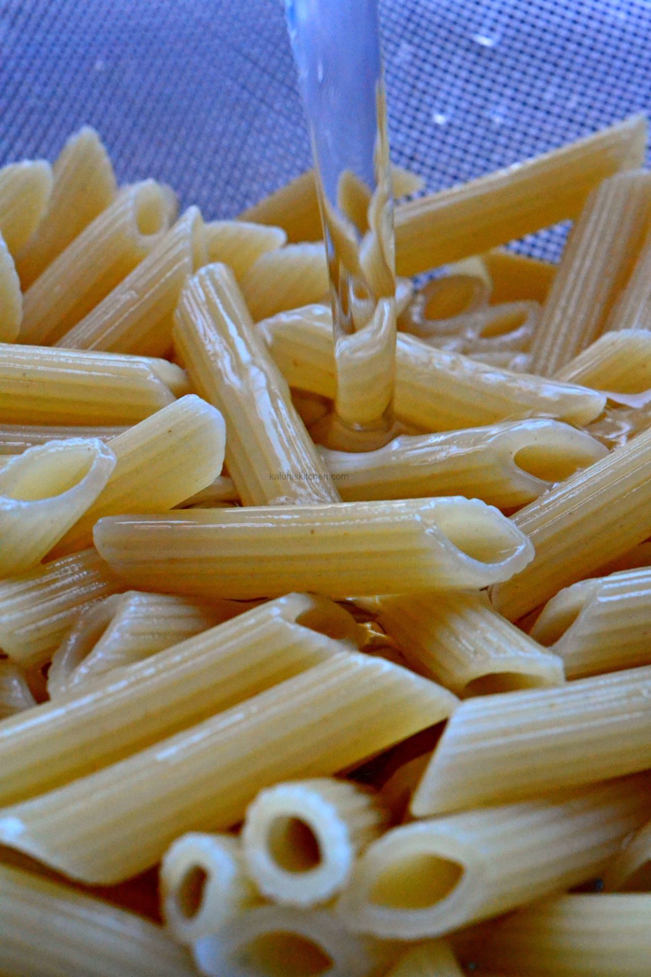 pass the cooked pasta throguh some cold water so that they do not stick   – Kaluhi's Kitchen